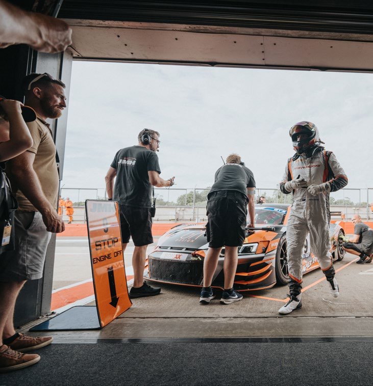 PB Racing crew in the garage